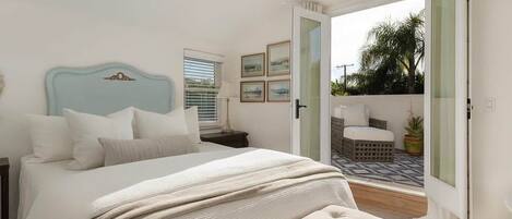 1 bedroom, desk, iron/ironing board, travel crib