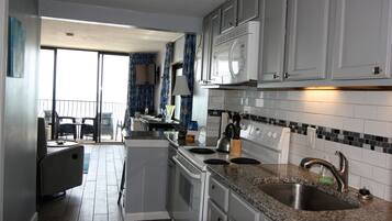 Coffee/tea maker, fridge, microwave, oven