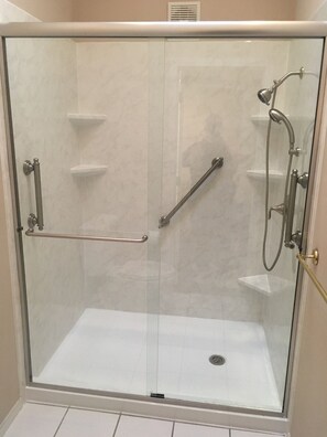 Combined shower/tub, hair dryer, towels, soap
