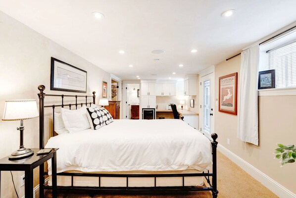 1 bedroom, desk, iron/ironing board, travel crib