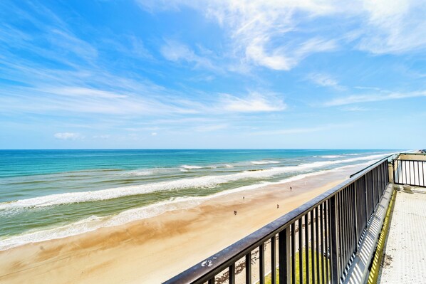 On the beach, sun-loungers, beach towels