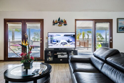 Lakefront Home w/ Stunning Sunsets, Private Beach, Dock & Game Loft