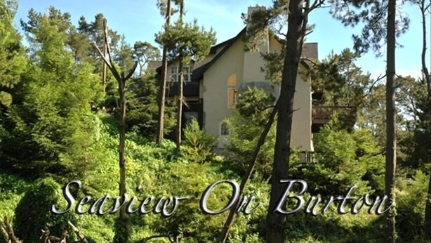 A house surrounded by trees.