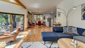 A modern living room with a sofa, chairs, and a dining area. - Pearl st, A/C, Fireplace, Views and Decks- Winner (Boulder)