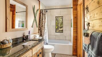 Combined shower/tub, hair dryer, towels, soap