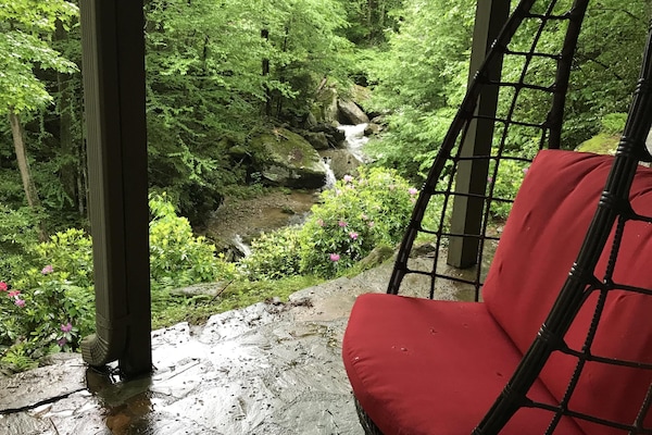 Enjoy the serene sounds of Mountain bliss, as you relax in our basket swings!!
