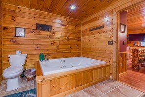 Bathtub, jetted bath, hair dryer, towels
