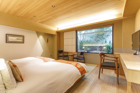 Habitación Confort con 2 camas individuales, para no fumadores (with Private Garden) | Ropa de cama hipoalergénica y artículos del minibar gratis