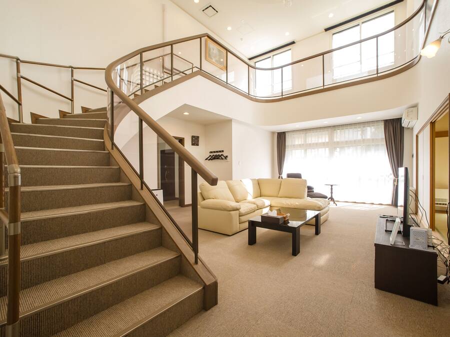 Luxury Apartment | Living area | 50-inch flat-screen TV with satellite channels, TV, DVD player