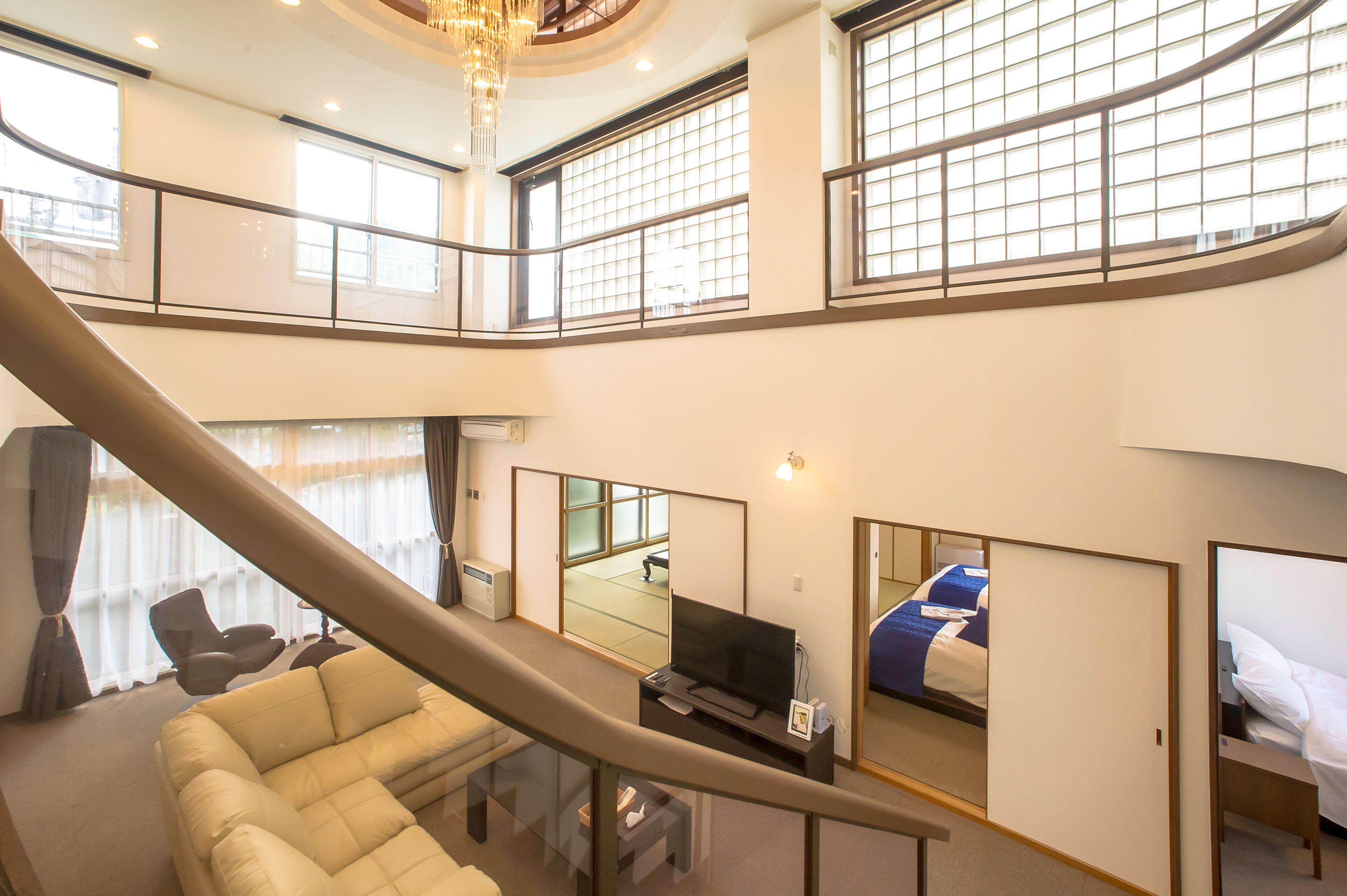 Luxury Apartment | Living area | 50-inch flat-screen TV with satellite channels, TV, DVD player