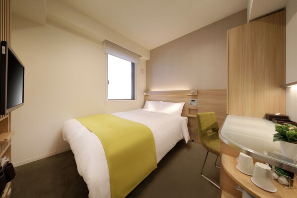 Een kluis op de kamer, een bureau, gratis wifi, beddengoed