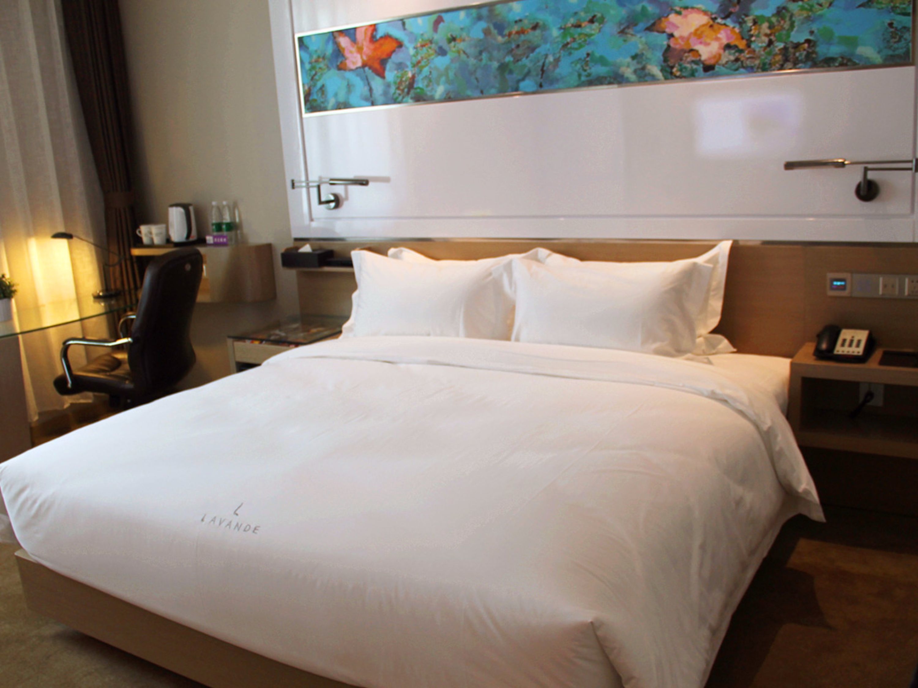 Habitación Deluxe | Minibar, escritorio, cortinas blackout y tabla de planchar con plancha 