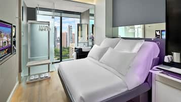 Premium bedding, in-room safe, blackout curtains, soundproofing