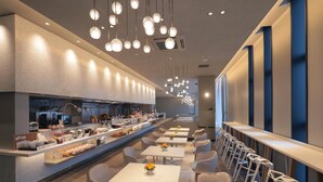 A modern restaurant with a long counter, multiple seating areas, and pendant lighting. - Kisarazu Washington Hotel (Kisarazu)