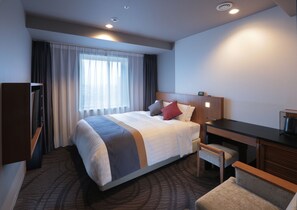 Coffres-forts dans les chambres, bureau, fer et planche à repasser