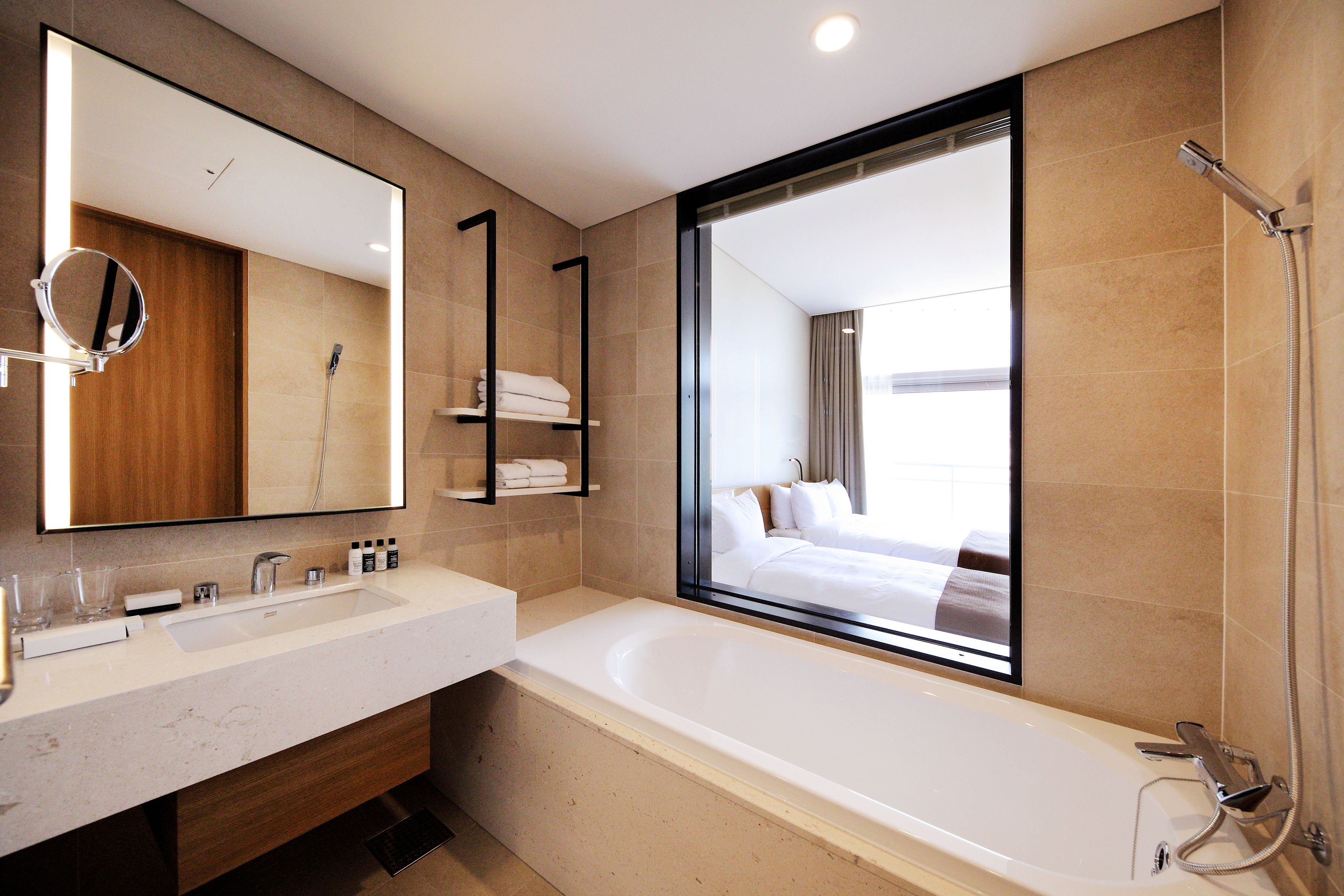 separate bathtub and shower, free toiletries, hair dryer, bathrobes