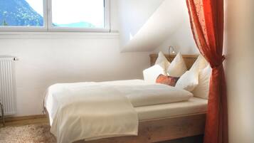 Premium bedding, blackout curtains, soundproofing, free cots/infant beds