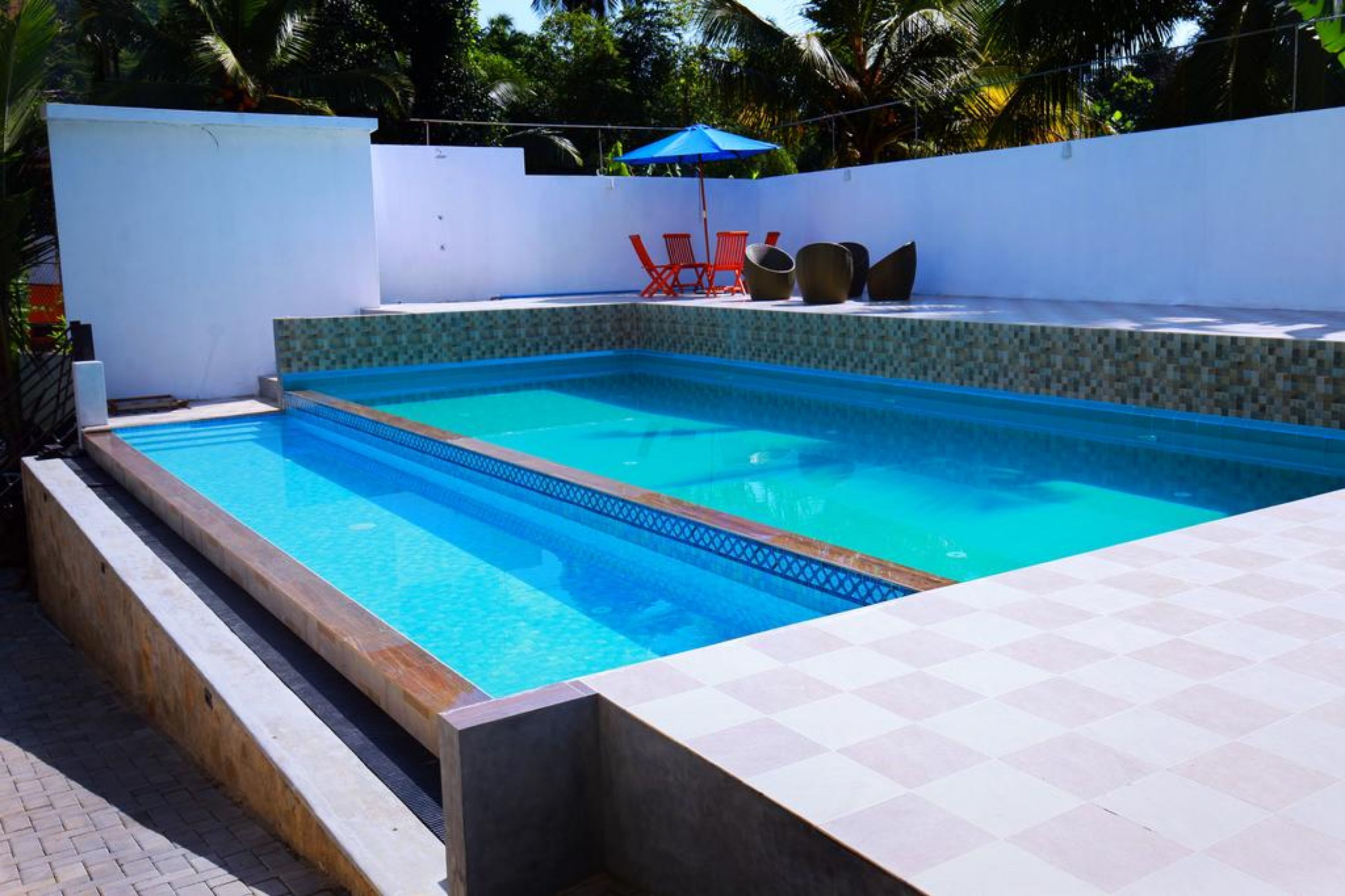 Outdoor pool, pool umbrellas, pool loungers