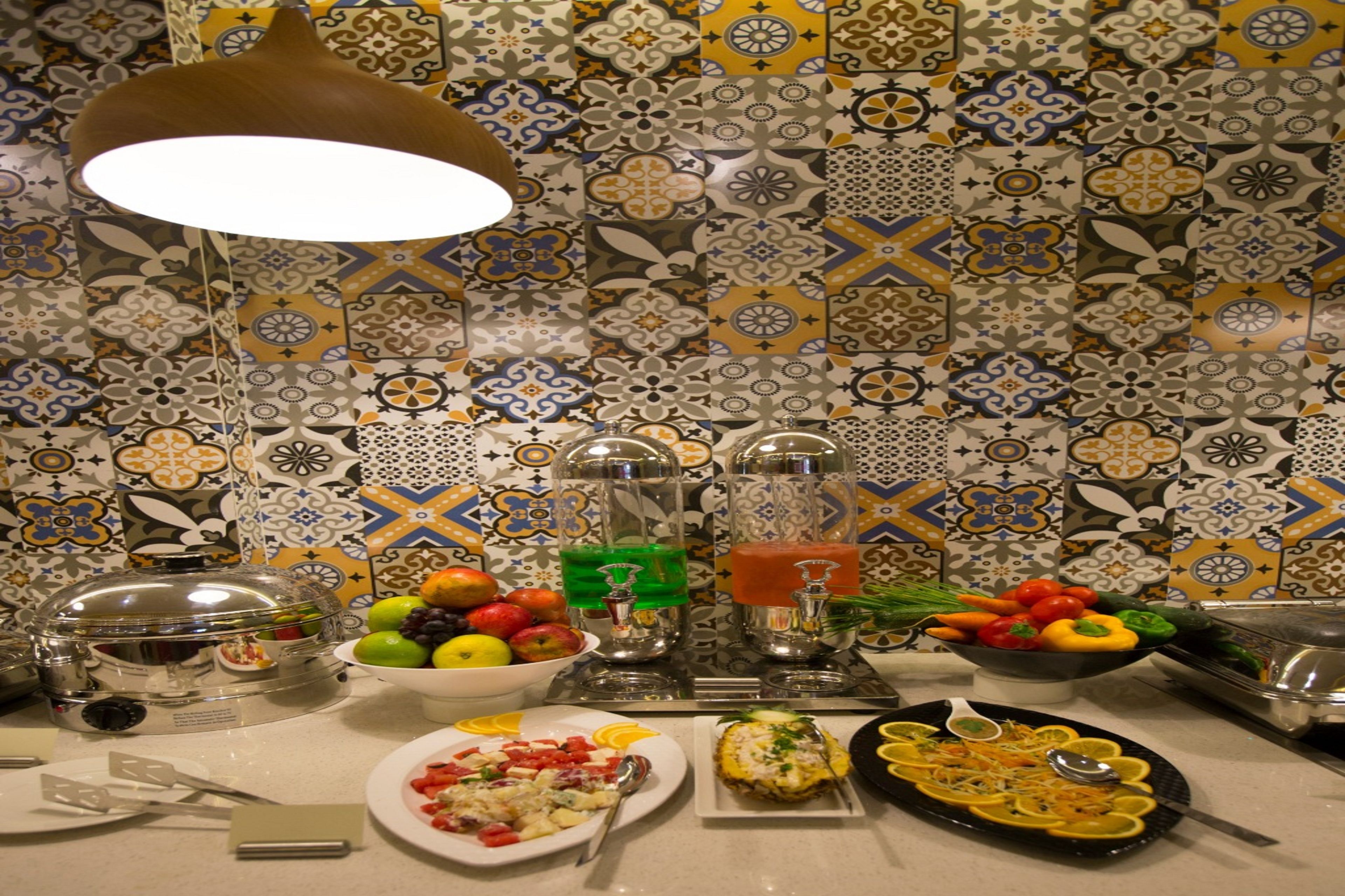 Daily buffet breakfast (INR 200 per person)