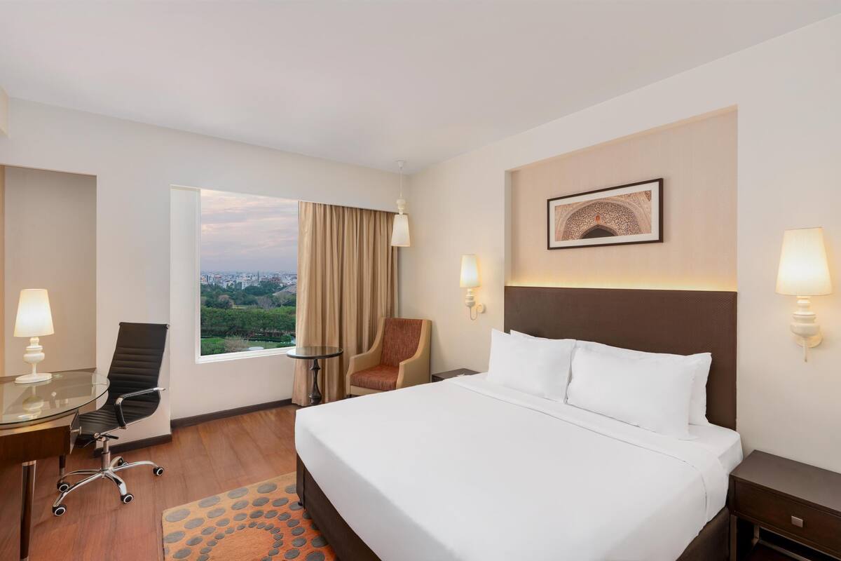 ห้องดีลักซ์ | ผ้าปูที่นอน Frette จากอิตาลี, เครื่องนอนระดับพรีเมียม, เตียงเมมโมรีโฟม