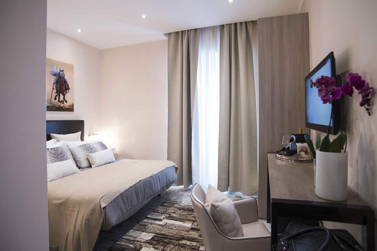 Suite junior | Ropa de cama de alta calidad y minibar