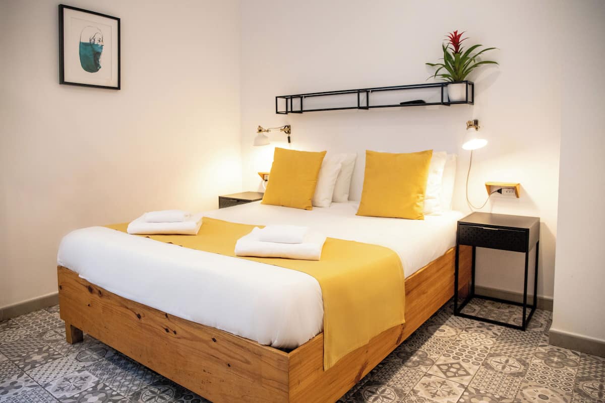 Basic double room with exterior bathroom, 1 double bed | 1 bedroom, down comforters, desk, blackout drapes