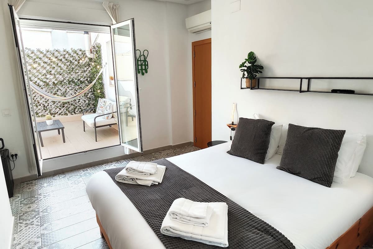 Penthouse, Terrace | 1 bedroom, down comforters, desk, blackout drapes