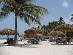 Private beach nearby, white sand, beach cabanas, sun loungers - The Sanctuary at Los Corales (Punta Cana)