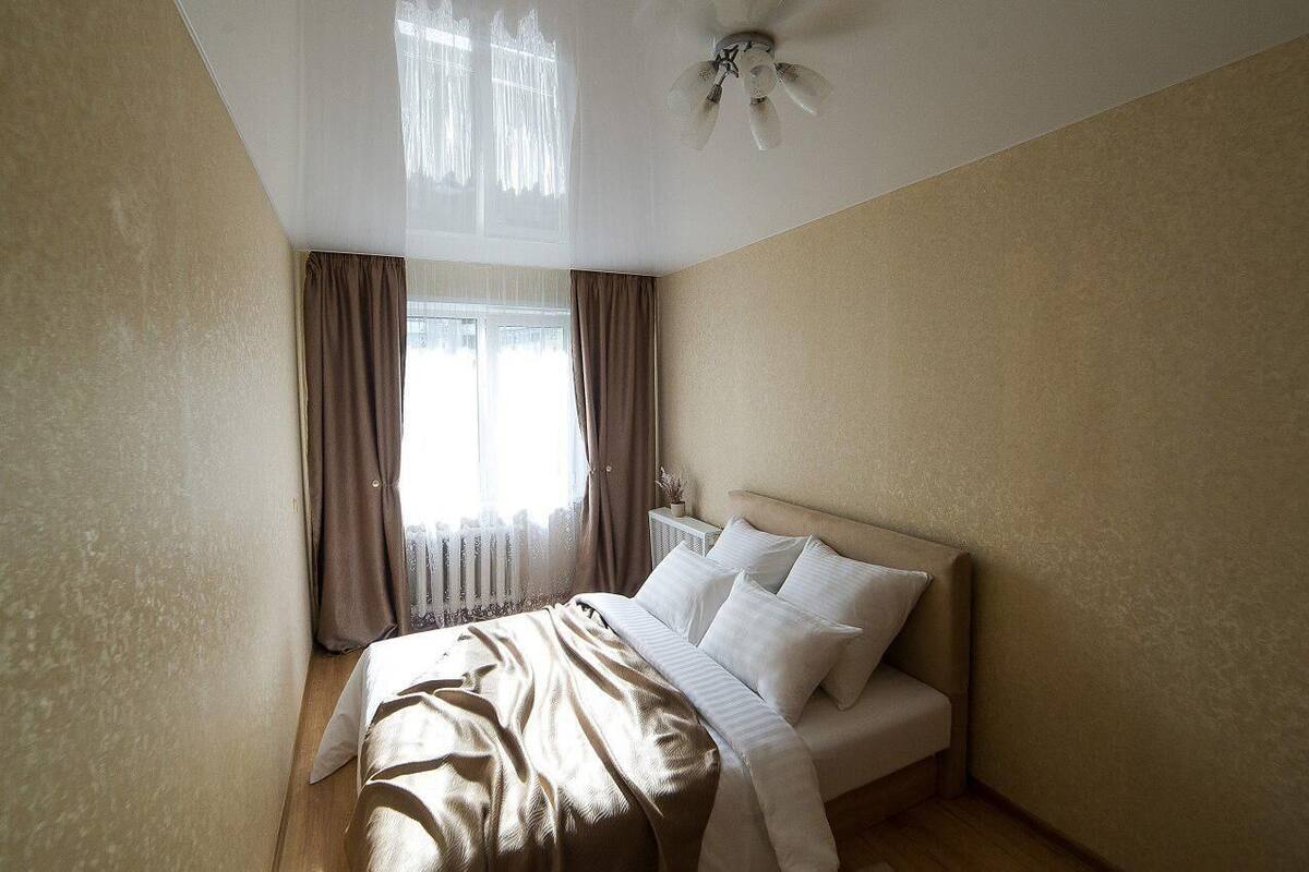 Premium bedding, desk, laptop workspace, iron/ironing board