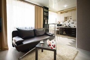 Apartment on Gorkogo 34 | Living area | Flat-screen TV - PaulMarie Apartments in Bobruisk (Bobruysk)