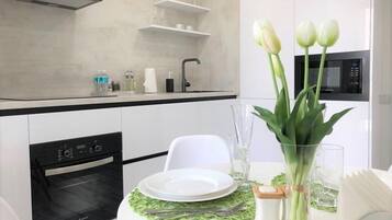 Apartment on Socialisticheskaya, 199 | Private kitchen | Fridge, microwave, stovetop, coffee/tea maker