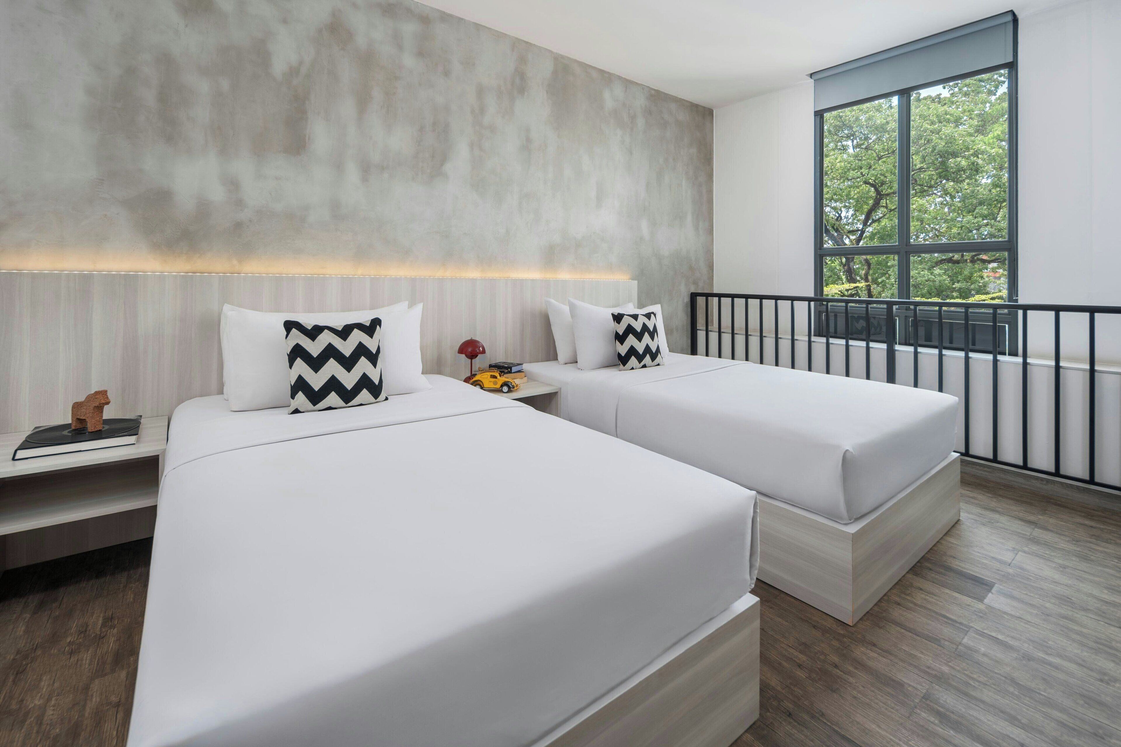 family suite (mezzanine) | 1 bedroom, pillow-top beds, in-room safe, desk