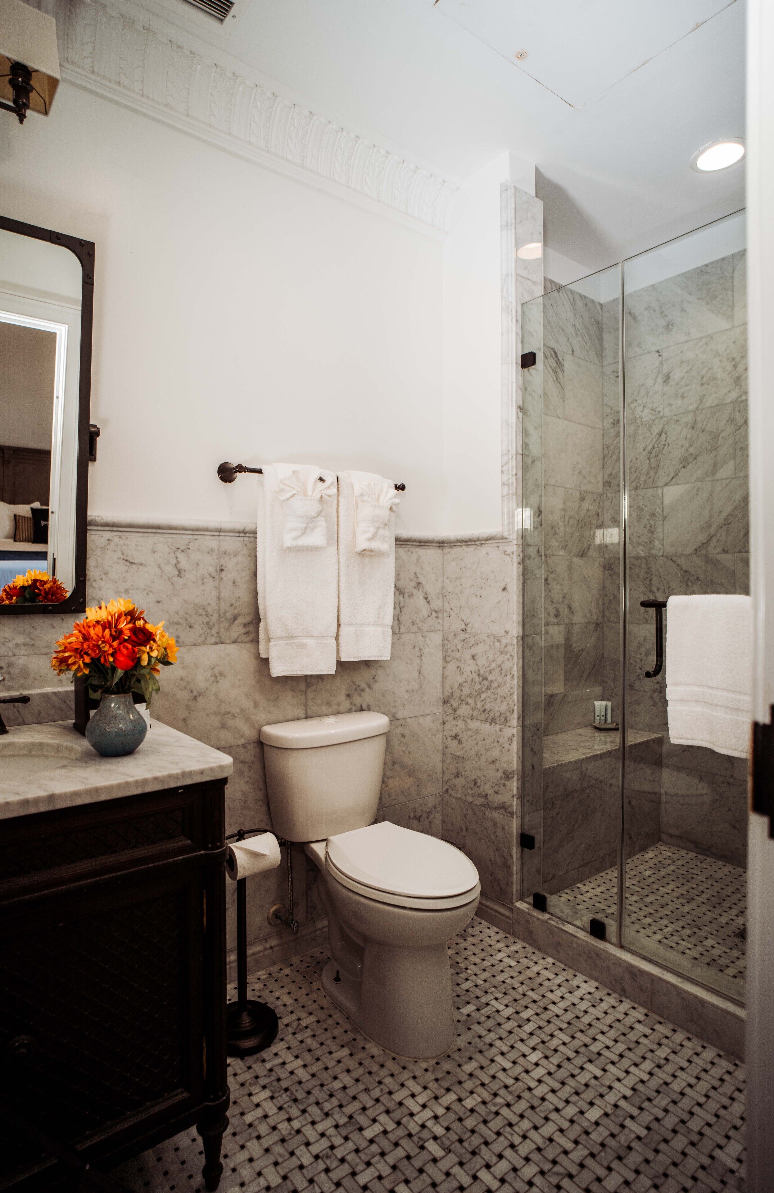 frenchmen king (balcony access) | bathroom | shower, rainfall showerhead, designer toiletries, hair dryer