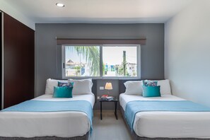 Apartment, Multiple Beds, Garden View (Sabbia 2104 - 3 bedrooms all-in suite) | 3 bedrooms, in-room safe, individually decorated, desk