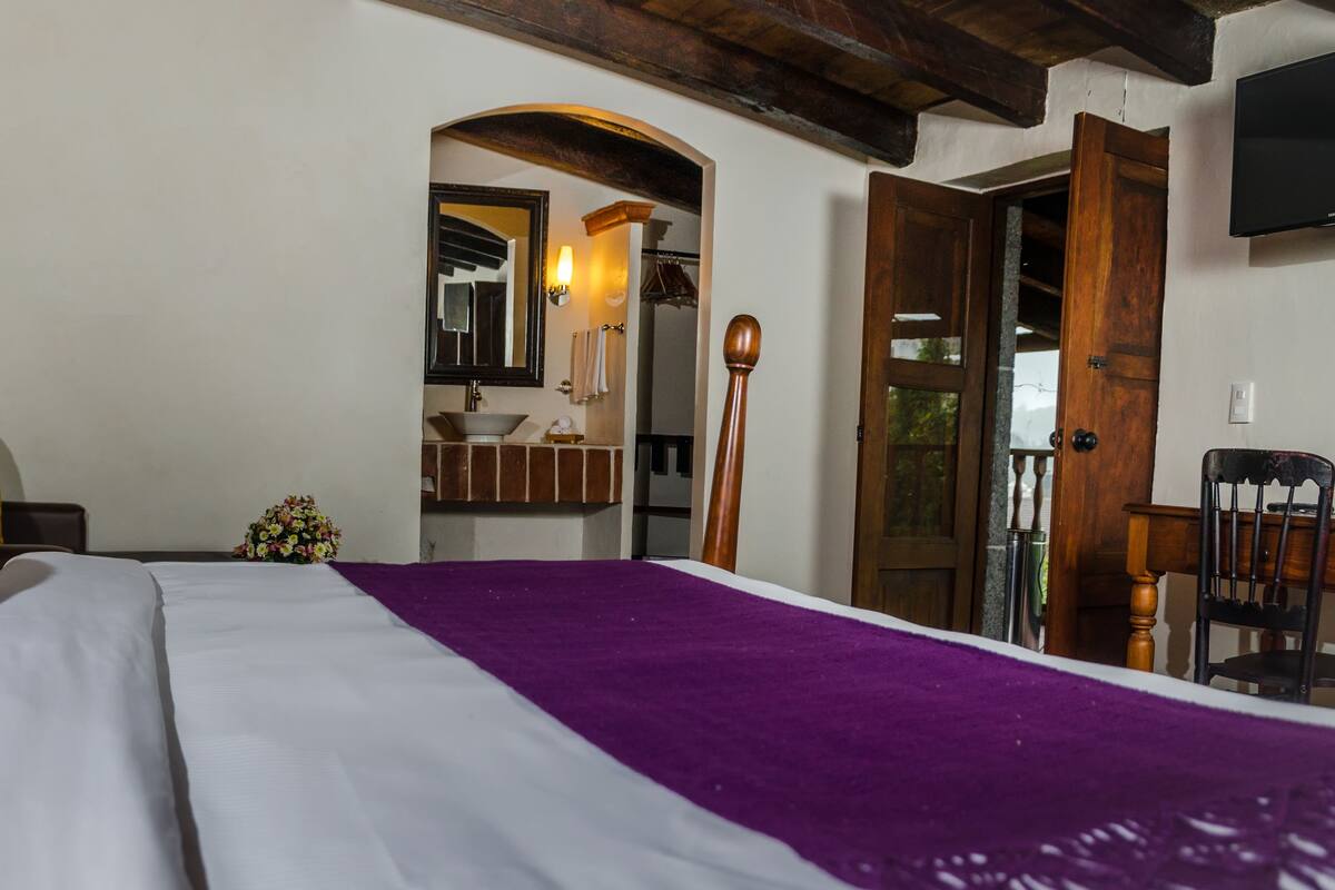 Suite, 1 King Bed | In-room safe, desk, iron/ironing board, free cots/infant beds