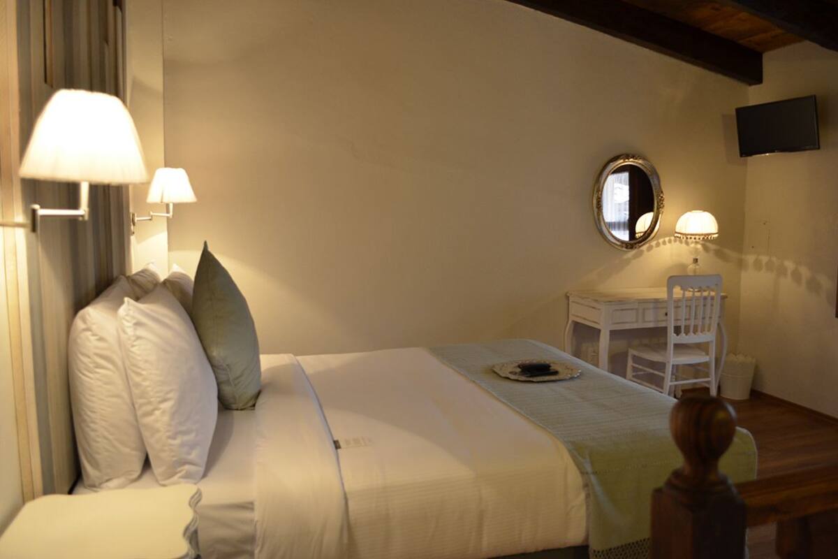 Junior Suite, 1 King Bed | In-room safe, desk, iron/ironing board, free cots/infant beds