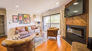 Condo, 1 Bedroom (Efficiency) | Living area | Flat-screen TV