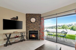 Condo, 1 Bedroom (Efficiency) | Living area | Flat-screen TV