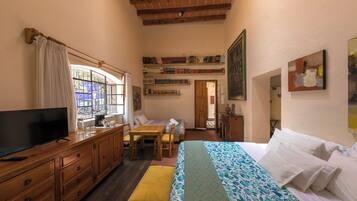 Deluxe Studio Suite, Garden View | In-room safe, individually decorated, individually furnished, desk