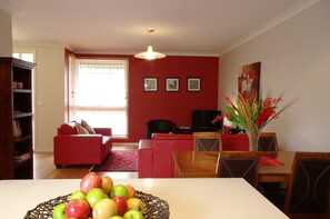 2 Bedroom Villa with 1.5 Bathrooms | Living area | Plasma TV, DVD player - Boutique Stays - Sandyside 2 (Sandringham)