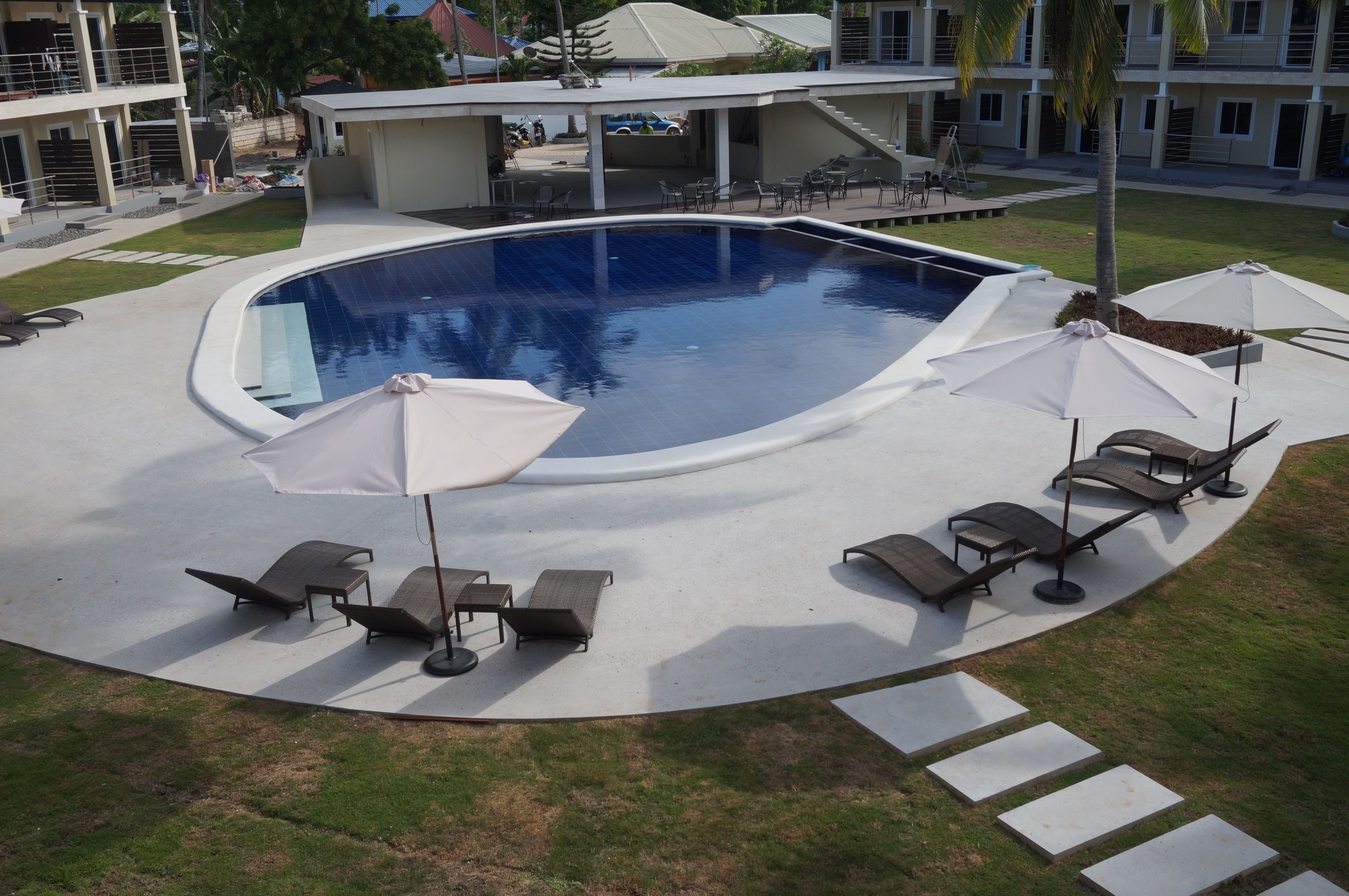 outdoor pool, pool loungers
