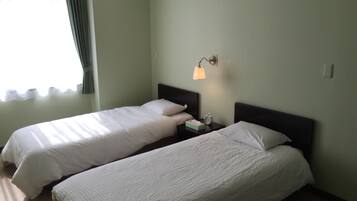 Laptop workspace, free WiFi, bed sheets