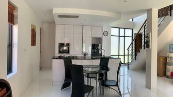 3 Bedroom Villa | Private kitchen | Full-size fridge, microwave, oven, stovetop
