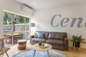 3 Bedroom House with 2.5 Bathrooms | Living room | Flat-screen TV, DVD player - BOUTIQUE STAYS - Central Park (South Melbourne)