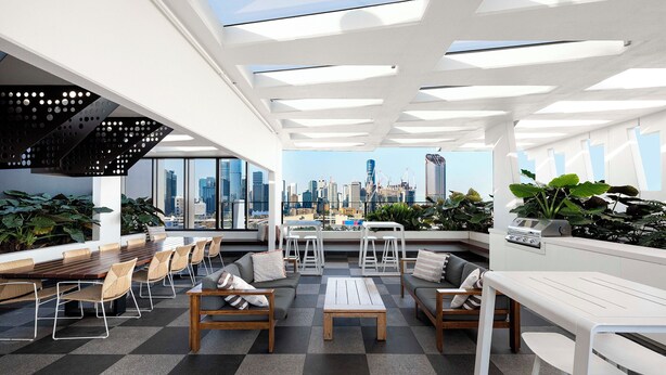 A modern lounge with a city view, featuring a checkered floor, wooden furniture, and potted plants.
