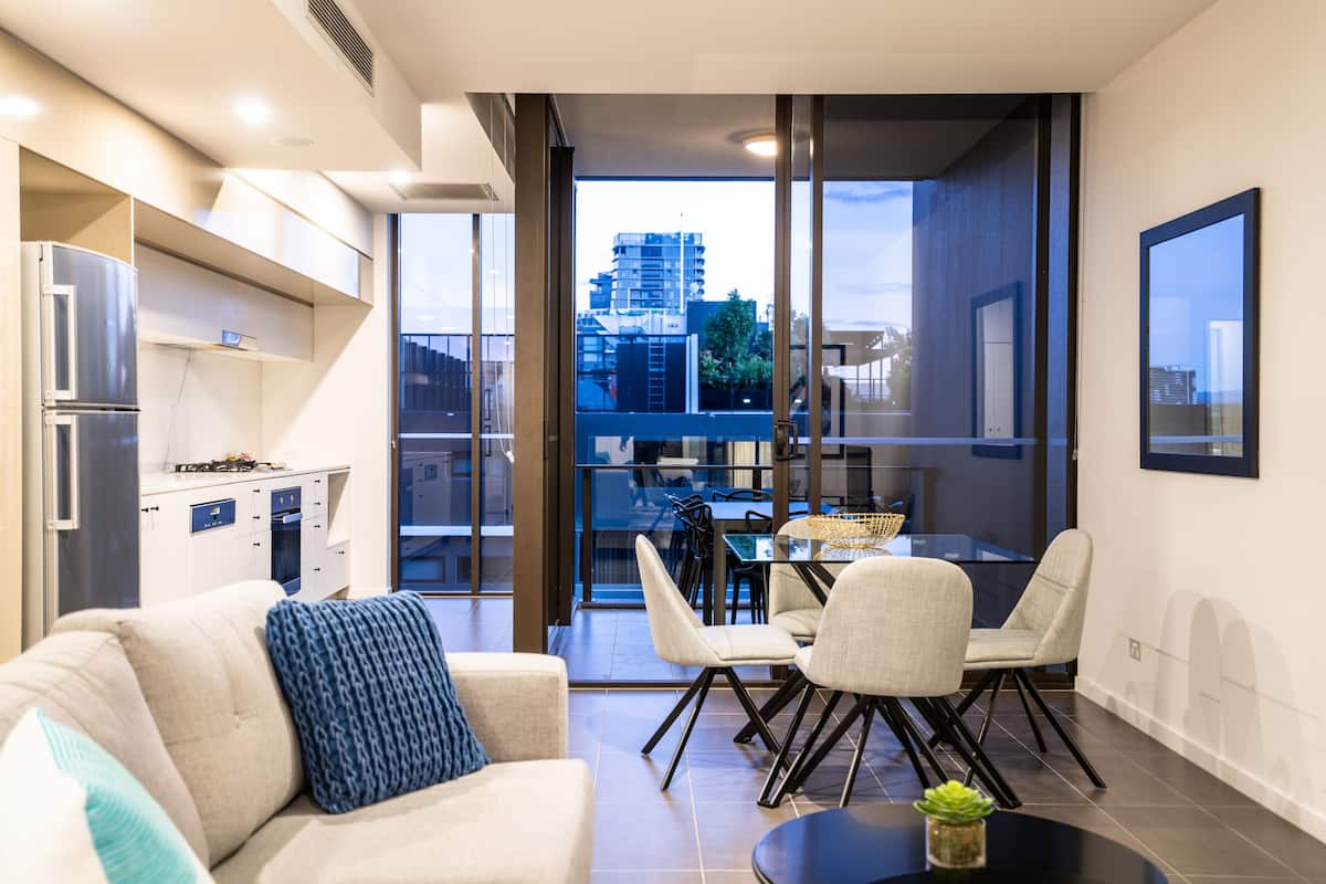 1 bedroom apartment with balcony and standard views | living area | 42-inch lcd tv with cable channels, tv, dvd player