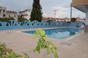 Outdoor pool, pool umbrellas, pool loungers