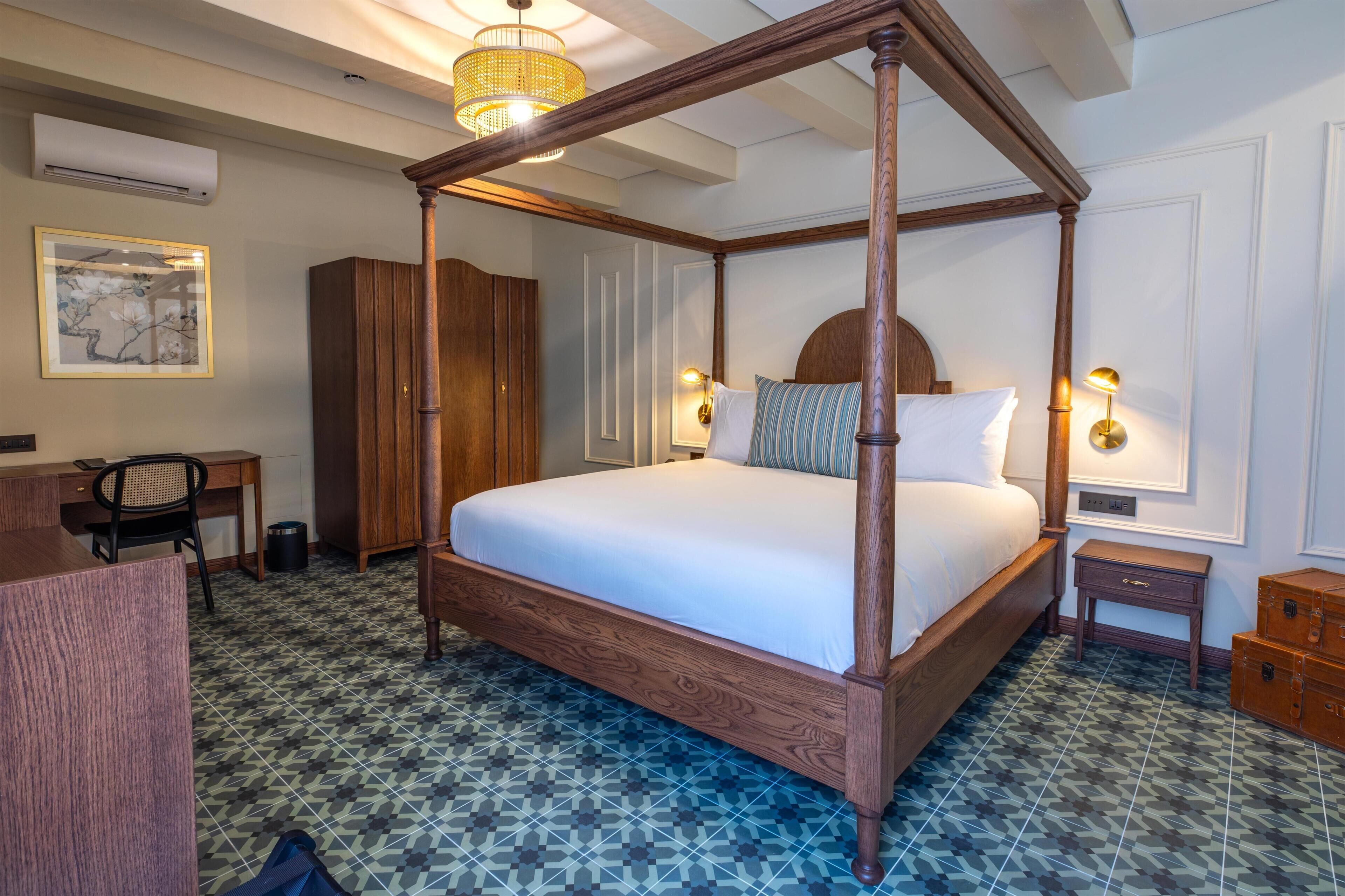 Habitación Deluxe, 1 cama King size, para no fumadores | Artículos del minibar gratis y caja de seguridad en la habitación 