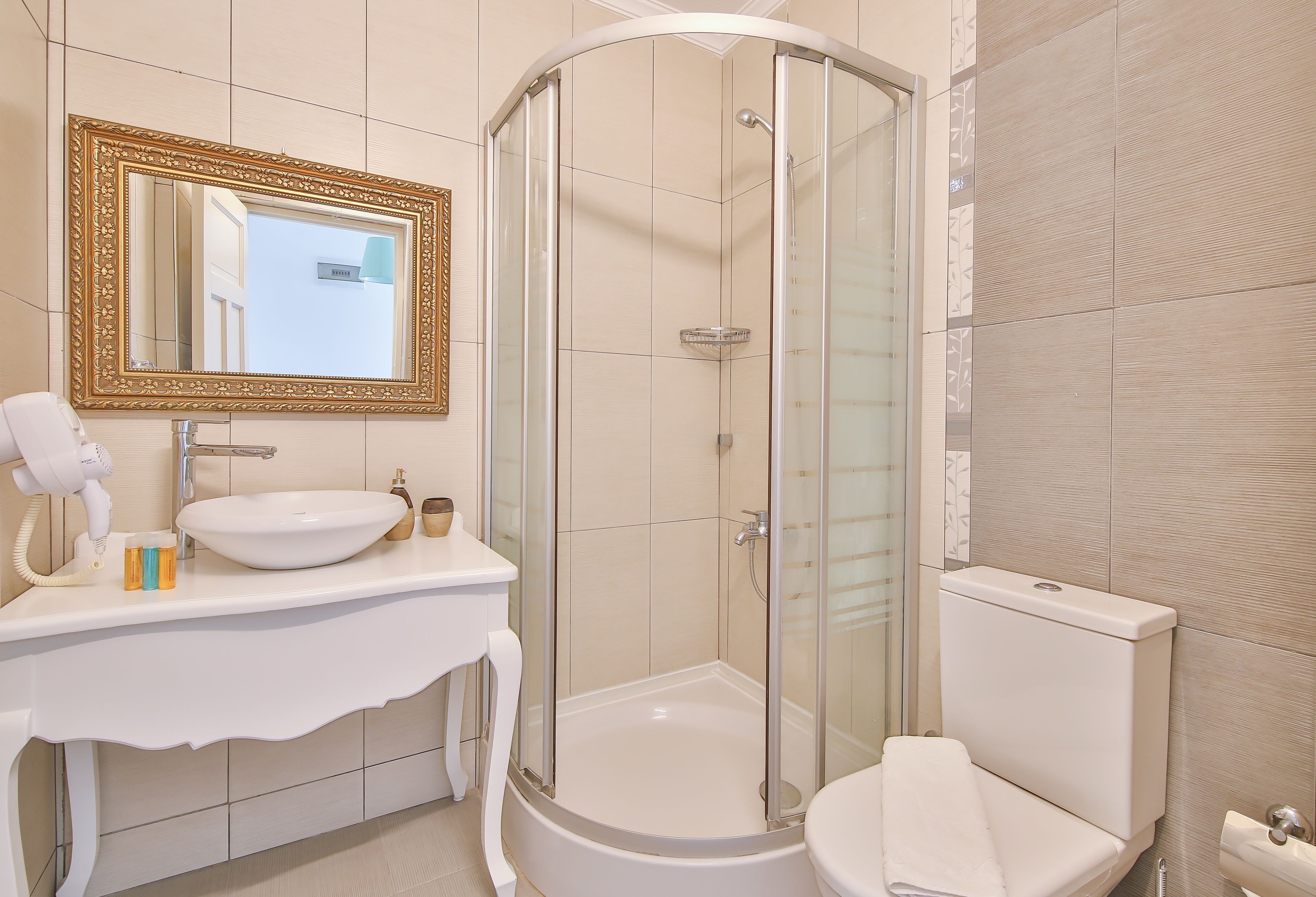 shower, free toiletries, hair dryer, slippers