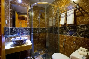 Shower, free toiletries, hair dryer, slippers
